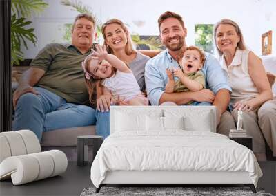 Happy family with kids, parents and grandparents on sofa with smile in living room. Happiness, family and generations of men, women and children spending time in home together making happy memories. Wall mural