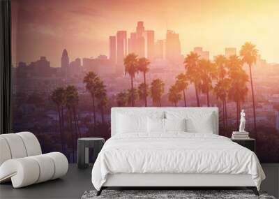 Los Angeles hot sunset view with palm tree and downtown in background. California, USA Wall mural