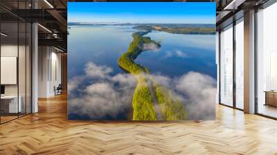 Aerial view of Pulkkilanharju Ridge, Paijanne National Park, southern part of Lake Paijanne. Landscape with drone. Fog, Blue lakes, fields and green forests from above on a sunny summer morning. Wall mural