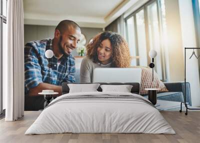 Finance, budget and ebanking couple working on laptop looking happy and hopeful about savings, investment and insurance. Boyfriend and girlfriend planning financial future lifestyle together at home Wall mural