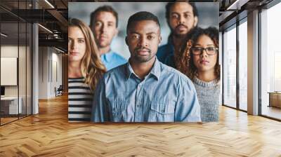 Were the team you want. Portrait of a group of creative businesspeople standing in their office. Wall mural