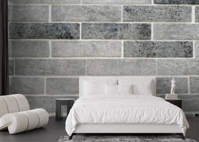 Mottled grey brick tiles with white grouting. Wall mural