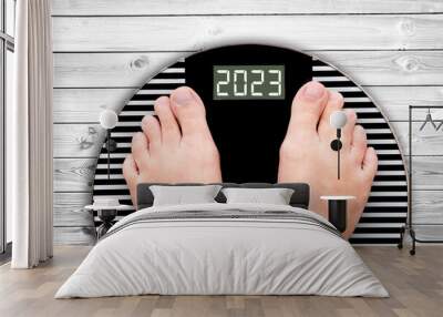 2023 feet on a weight scale, nutrition and diet new year card Wall mural