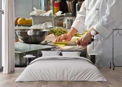 chef at work, chopping vegetables in a restaurant professional kitchen Wall mural