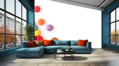 Colorful sugar coated round candies isolated on panoramic white background Wall mural