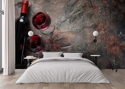 Top view of red wine glasses and bottle on isolated dark background, copy space. generative AI image Wall mural