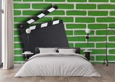 Blank movie production clapper board brick wall background Wall mural