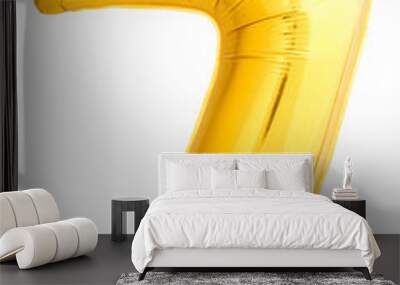 Golden number 7 made of inflatable balloon isolated on white background. One of full number set Wall mural