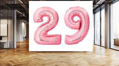 Number 29 twenty nine made of rose gold inflatable balloons isolated on white background. Pink helium balloons forming 29 twenty nine number Wall mural