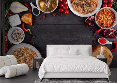 The concept of Eastern asian festive cuisine. Assorted Uzbek food set, pilaf, samsa, lagman, manti, shurpa restaurant concept Eastern arabic new year and Christmas dish from lamb served cookware. Wall mural