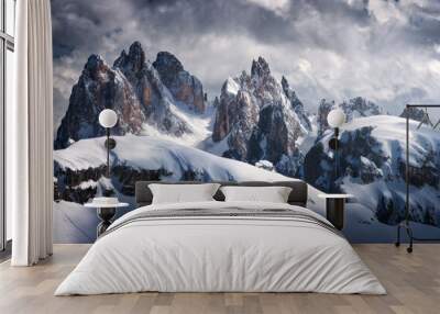 Beautiful mountain peaks in snow in winter. Dramatic landscape with high snowy rocks, overcast sky with clouds in cold evening. Tre Cime in Dolomites, Italy. Alpine mountains. Nature. Dark scenery Wall mural