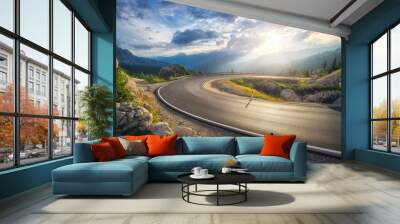 Mountain road at colorful sunset in summer. Dolomites, Italy. Beautiful curved roadway, rocks, stones, blue sky with clouds. Landscape with empty highway through the mountain pass in spring. Travel Wall mural