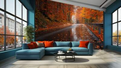 Road in beautiful forest in golden autumn. Empty mountain road, trees with red and orange foliage in rain. Colorful landscape with wet road in foggy woods in fall. Travel. Road trip. Transportation Wall mural