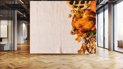 Fall thanksgiving table with roasting chicken or turkey, nuts, pie, pumkins and other food on light tablecloth Wall mural