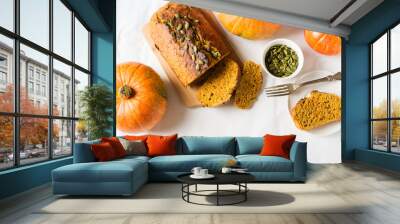 Homemade pumpkin loaf cake on white background. Wall mural