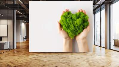 World earth day concept with green plant heart on blue background, Wall mural