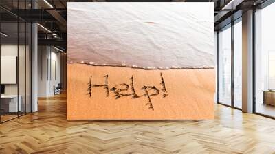 Word HELP on sand Wall mural