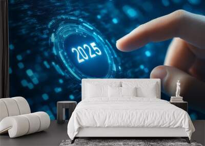 Finger is pressing the button where is written 2025, blue digital background Wall mural