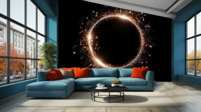 Golden glitter circle of light shine sparkles and gold spark particles in circle frame on black background. Christmas magic stars glow, firework confetti of glittery ring shimmer Wall mural