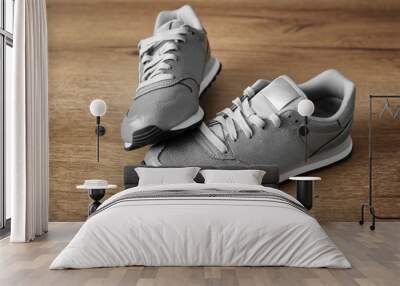 Gray sneakers as a lifestyle of a modern person Wall mural