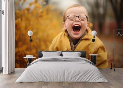 Happy boy with Down syndrome having fun and laughing Wall mural