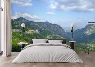 Mountains and blue sky in the clouds 2 Wall mural