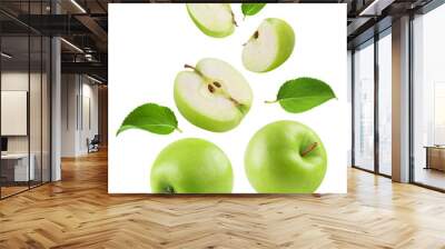 Apples isolated. Levitation of ripe green apples, apple halves and slices on a transparent background. Wall mural