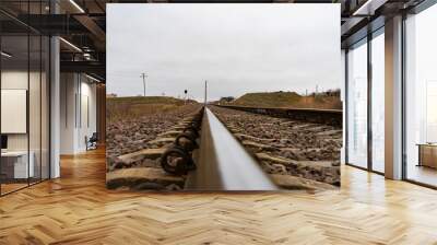 railroad tracks in the morning. railway rail. railroad rails close up Wall mural