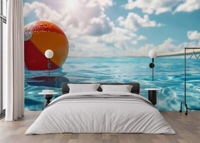 Summer holidays background with colorful beach ball floating on swimming pool and copy space Wall mural