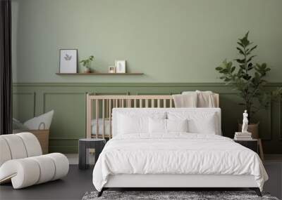 Wooden baby bed in children bedroom, sage green wall with posters. Wall mural