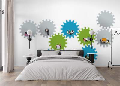 business people over colorful machine gear wheel. Cogwheel. Wall mural