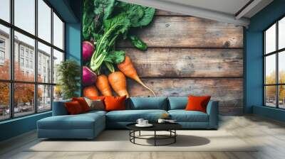 Freshly harvested vegetables, including beets and carrots, beautifully displayed on rustic wood Wall mural