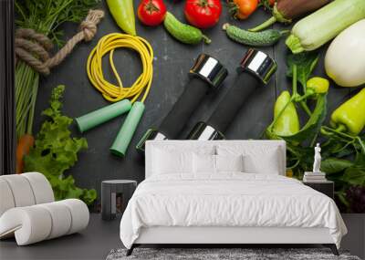 Fresh vegetables, diet and sport on a black wooden background Wall mural