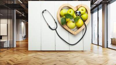 Health. Fresh apples on a white wooden background Wall mural