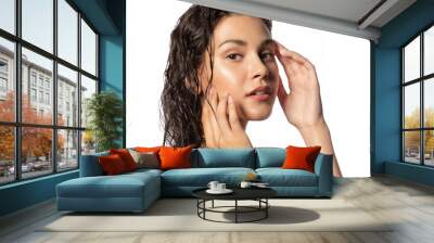 Skincare and natural woman beauty. Young female with wet hairs after bath touch healthy pure face. Close-up studio portrait of beautiful sensual girl touching glowing hydrated facial skin. Wall mural