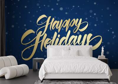 Golden handwritten calligraphic brush lettering of Happy Holidays on winter snowy sky background with snowflakes Wall mural