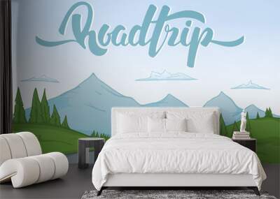 Vector illustration: Cartoon mountains landscape with travel car rides on the road on foreground and handwritten lettering of Road Trip. Wall mural