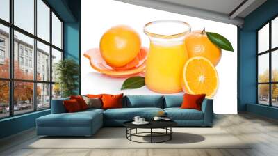 Fresh raw peeled oranges with juice squeezer jar Wall mural