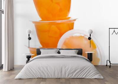 Single cups with peach in fruit jelly Wall mural