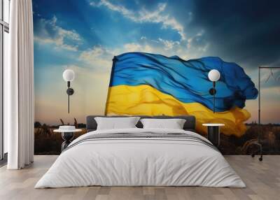 Ukrainian flag on wheat field against blue sky background. Independence Day of Ukraine, flag day. Wall mural