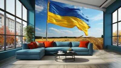 Ukrainian flag on wheat field against blue sky background. Independence Day of Ukraine, flag day. Wall mural