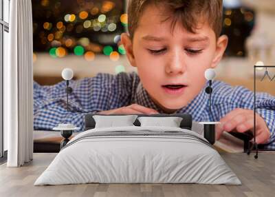 Kid reading book out loud.  Wall mural