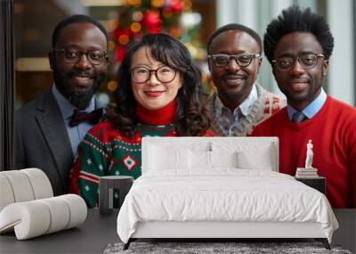 Four friends celebrate the holiday season together at a festive indoor gathering decorated with a Christmas tree Wall mural