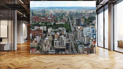 Yekaterinburg, the capital of the Urals, aerial view. Many beautiful residential and commercial buildings, as well as the architectural ensemble of the city, under the summer sun, top view. Wall mural