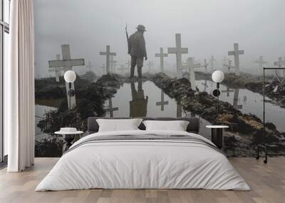 soldier among graves in misty field. a lone soldier in world war i uniform stands vigil by weathered Wall mural