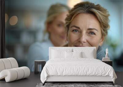 Portrait of happy mature woman with her caregiver in the background Wall mural