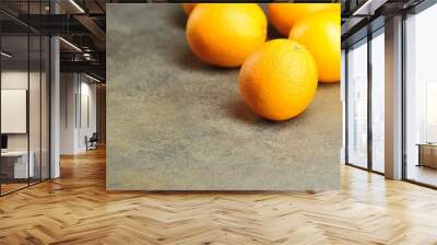 orange color of ripe oranges on a gray background Wall mural