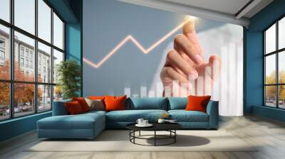 Businessman plan graph growth increase of chart positive indicators in his business Wall mural