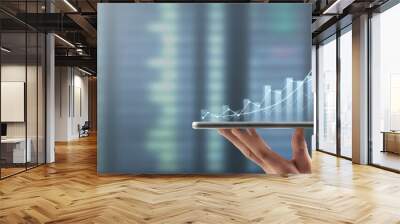 Hand holding smartphone device and touching screen. Stock exchange market concept Wall mural