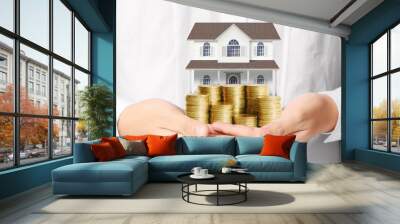 Mortgage concept by money house from coins Wall mural